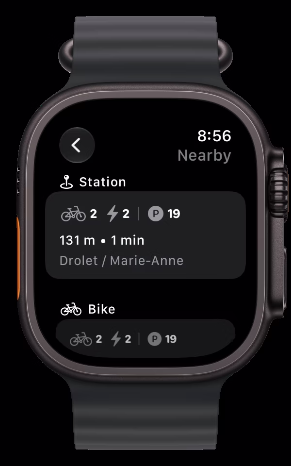 The Nearby page on Apple Watch Ultra: the nearest station, Drolet / Marie-Anne, 131 m away, with its bikes, e-bikes, and parking spots, then the nearest bike.